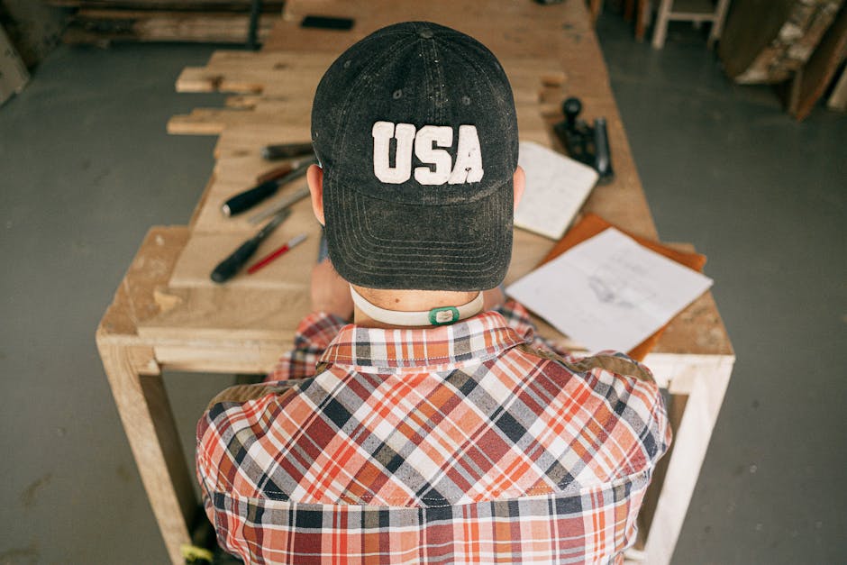 Master carpenter working in the wood shop